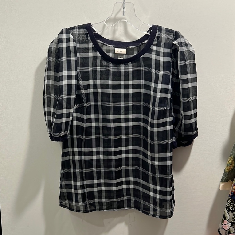 Small, see-through top. Super cute for any occasion!
